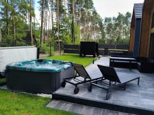 Holiday Hossa House 391 - całoroczne domy z Jacuzzi Sława