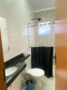 Casa em condomínio 400m da praia