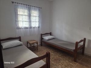 Casa em condomínio Boracéia