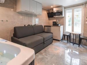 Appartements Le lovely - Spa & Jacuzzi : photos des chambres