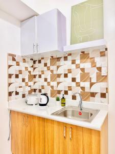 New Condo at Grand Riviera Suites across US Embassy