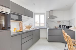 Appartements Movie Prestige - Elegant - Moderne - Netflix avec VideoProjecteur - Stationnement facile : photos des chambres