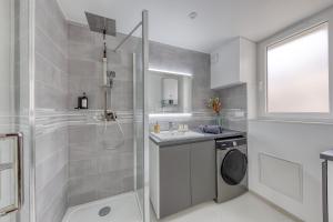 Appartements Movie Prestige - Elegant - Moderne - Netflix avec VideoProjecteur - Stationnement facile : photos des chambres
