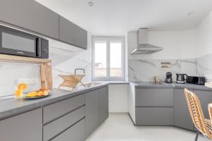 Appartements Movie Prestige - Elegant - Moderne - Netflix avec VideoProjecteur - Stationnement facile : photos des chambres