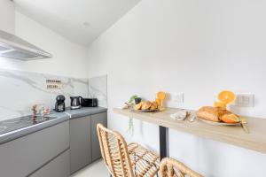 Appartements Movie Prestige - Elegant - Moderne - Netflix avec VideoProjecteur - Stationnement facile : photos des chambres