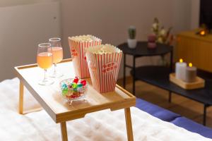 Appartements Movie Prestige - Elegant - Moderne - Netflix avec VideoProjecteur - Stationnement facile : photos des chambres