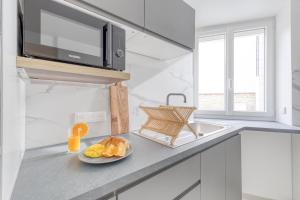 Appartements Movie Prestige - Elegant - Moderne - Netflix avec VideoProjecteur - Stationnement facile : photos des chambres