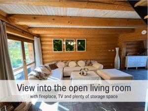 Blockhaus Malmkrog with garden, bright rooms, and an open kitchen