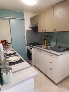 Appartements Studio cozy proche Paris - Aeroport Roissy Charles-de-Gaulle : photos des chambres