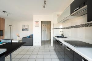 EVASION Premium, clim, parking privé, centre-ville