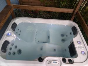 Appartements Le Chalet Bleu - jacuzzi : photos des chambres