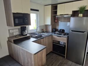Appartements Le Domaine de Litteau 4 etoiles emplacement 404 : photos des chambres