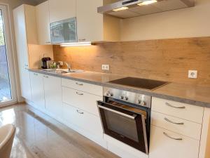 "ONE" - Premium Apartments Seekirchen - Dein Rückzugsort mit exklusivem Flair und privater Terrasse