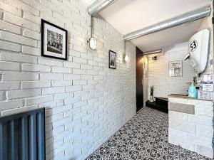 Evasion Verdoyante Vue sur jardin avec balcon et parking