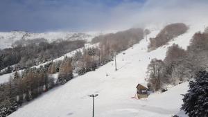 Appartements Studio-cabine au pied des pistes a Super Besse : photos des chambres