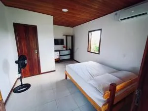 Boipeba suíte TERRA com varanda e quiosque gourmet - Nilo Peçanha