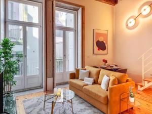 Loft with balcony on citys most important street