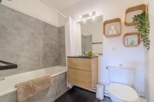 Appartements Les Elfes - avec entree autonome, clim neuve, jardin, parking prive & gourmandises offertes ! - : photos des chambres