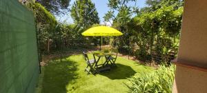 Appartements Les Elfes - avec entree autonome, clim neuve, jardin, parking prive & gourmandises offertes ! - : photos des chambres