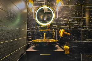 Appartements LA GOLDEN ROOM - Suite de Luxe avec Jacuzzi : photos des chambres