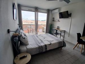 Appartements Studio clim parking dhuoda : photos des chambres