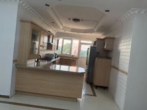 Three- Bedroom Masaki Sea View Retreat