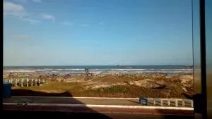 Pé na areia - 特拉曼达伊