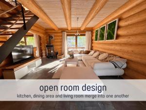 Blockhaus Malmkrog with garden, bright rooms, and an open kitchen