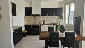 Appartements Appartement boheme : photos des chambres