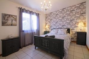 Villas Magnifique villa avec piscine : photos des chambres