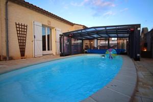 Villas Magnifique villa avec piscine : photos des chambres