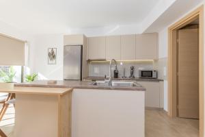 Raise Pagrati Serviced Apartments