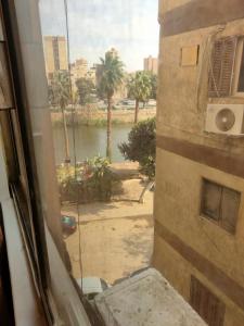 شقه 3 غرف هادئه على نيل المنيل القاهره