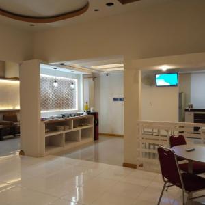 Wisma sidapore teluk bayur salakan