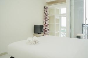 Comfort and Warm Studio Room at Akasa Pure Living BSD Apartment By Travelio