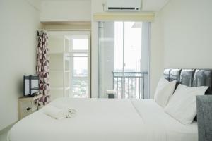 Comfort and Warm Studio Room at Akasa Pure Living BSD Apartment By Travelio