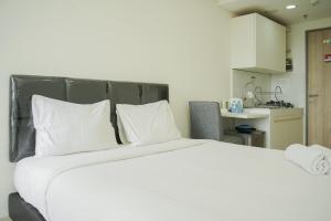 Comfort and Warm Studio Room at Akasa Pure Living BSD Apartment By Travelio