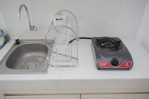 Comfort and Warm Studio Room at Akasa Pure Living BSD Apartment By Travelio