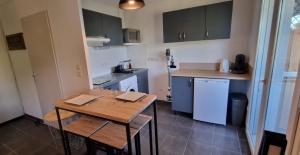 Appartements Jardin des oiseaux : photos des chambres