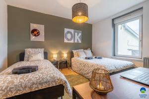 Appartements 1 STUDIO & 5 APPTS - 1 a 4 lits - 1 a 7 pers - max 31 pers - 1 immeuble - Confort, Flexibilite ------ ENGLISH - 1 STUDIO & 5 APTS - 1 to 4 beds - 1 to 7 guests - up to 31 - same building -- Cattenom : photos des chambres