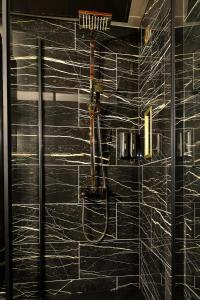 Appartements LA GOLDEN ROOM - Suite de Luxe avec Jacuzzi : photos des chambres