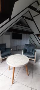 Appartements Logement Cosy avec mezzanine : photos des chambres