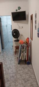 KitNet no térreo , pé na areia a 20 metros do mar na cidade de Praia Grande - SP sem garagem