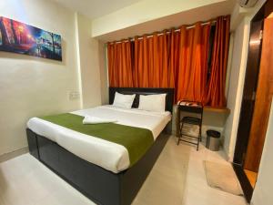 Deluxe Inn - Near Kokilaben Dhirubhai Ambani Hospital