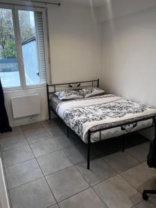 Sejours chez l'habitant Cozy bedroom in a shared apart : photos des chambres