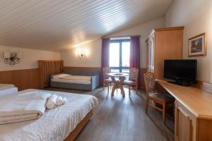 Quadruple Room - Annex room in Hotel Intermonti