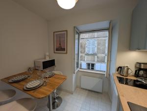 Appartements Joli appartement en centre-ville : photos des chambres