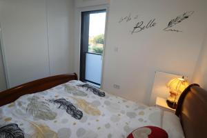 Appartements L-Aigue Marine by Tranquil at Home : photos des chambres