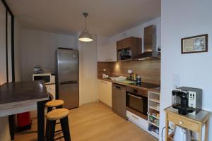 Appartements L-Aigue Marine by Tranquil at Home : photos des chambres