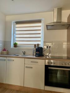 Appartement 4 - gemütliche Wohnung mit Küchenzeile und Bad
